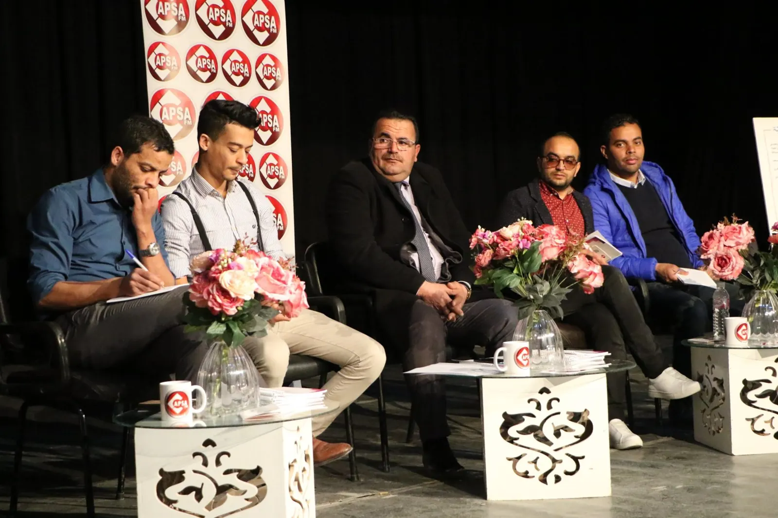 Public debate organised by Radio Capsa FM, speakers on stage